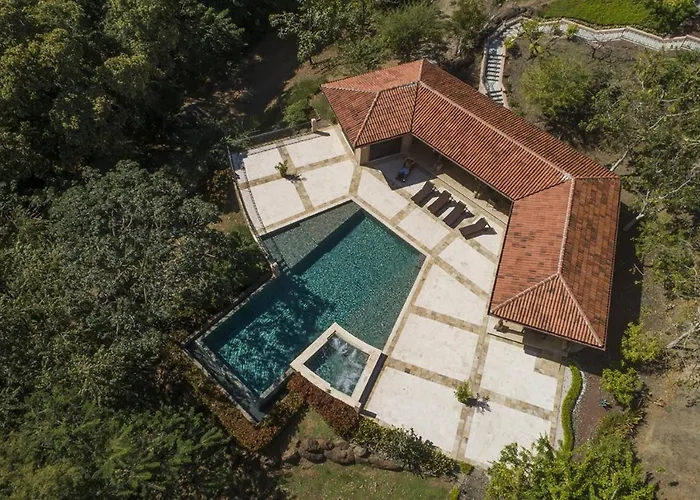 Сasa de vacaciones Spacious 2br With Ocean Glimpse - Jobo - Reserva Conchal Golf